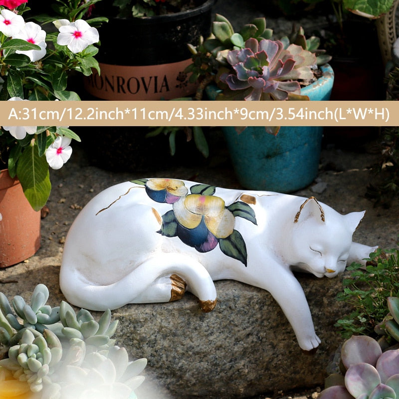 sleeping cat garden statue