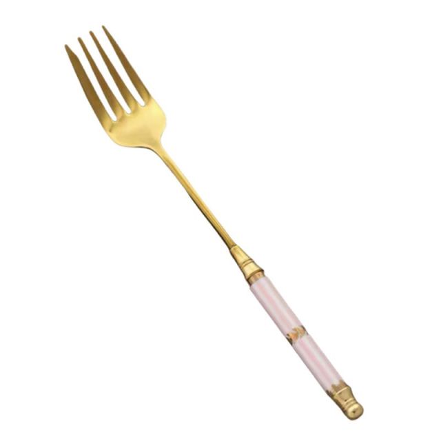 white and golden spoon for nodles
